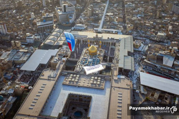 جشن عید سعید غدیر در حرم مطهر امیرالمومنین علی (ع) - اهتزاز پرچم من کنت مولاه بر فراز حرم مطهر علوی