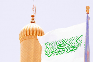 جشن عید سعید غدیر در حرم مطهر امیرالمومنین علی (ع) - اهتزاز پرچم من کنت مولاه در حرم مطهر علوی